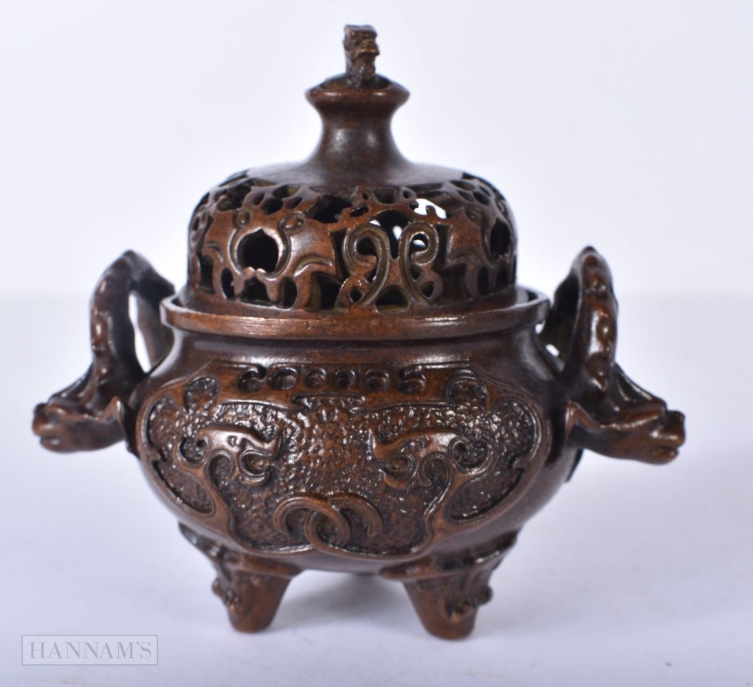 A CHINESE BRONZE CENSER. 8.75 cm x 8 cm. (1 of 5)