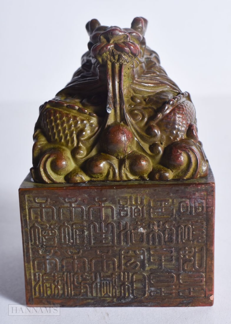 A CHINESE BRONZE BEAST SEAL. 8.5 cm x 6 cm.: A CHINESE BRONZE BEAST SEAL. 8.5 cm x 6 cm.