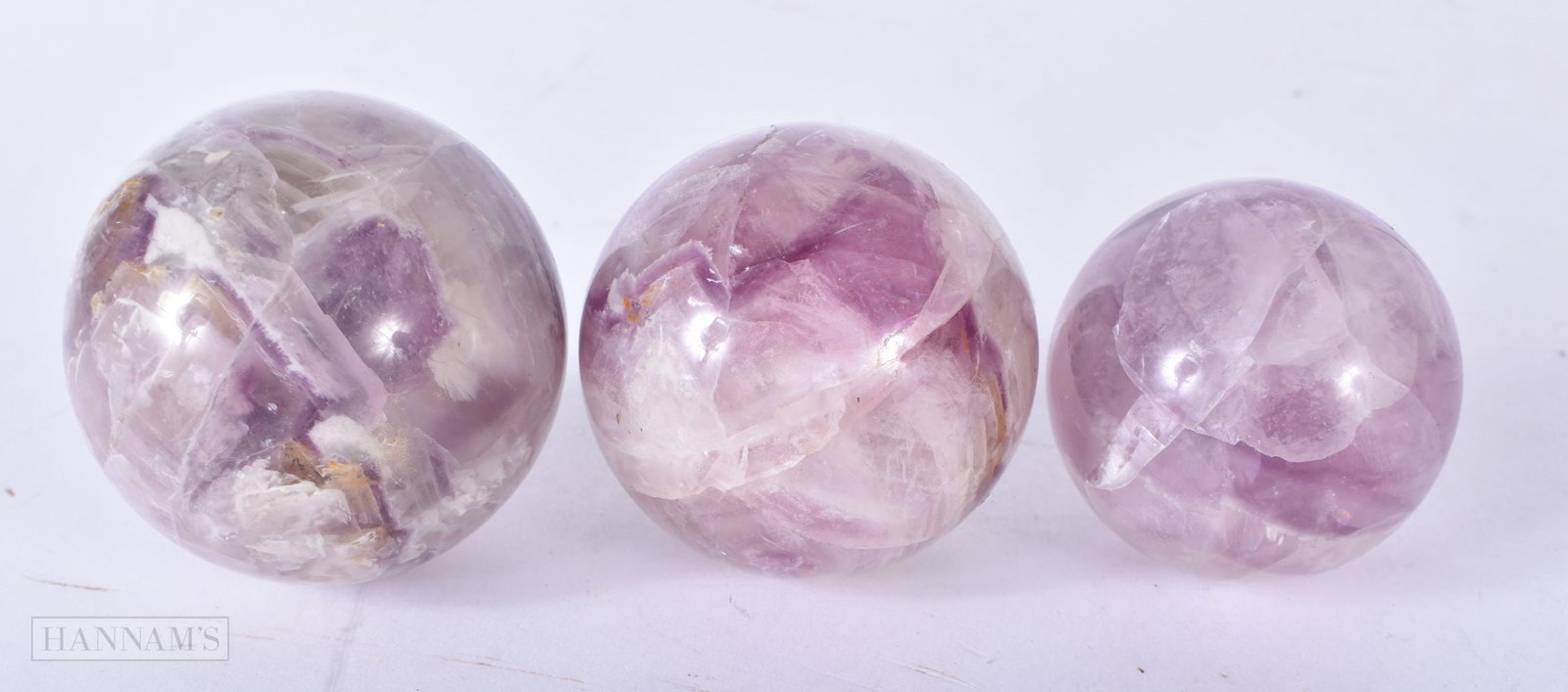 THREE CHINESE STONE BALLS. 5.75 cm wide. (3) (1 of 2)