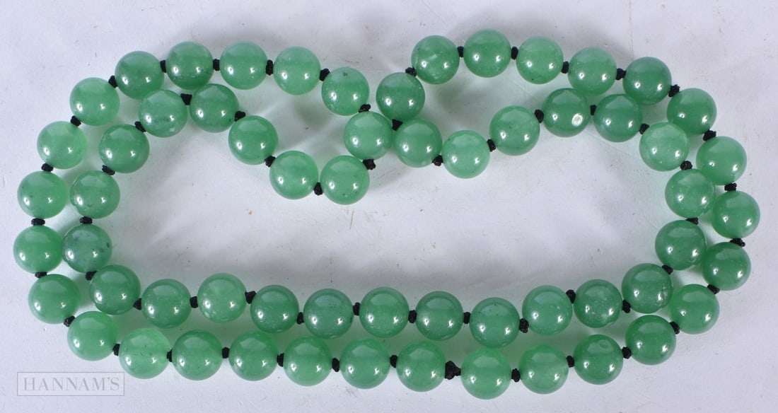 A CHINESE JADE NECKLACE. 88.8 grams. 74 cm long. (1 of 2)