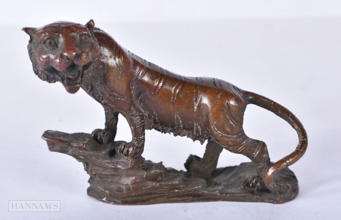 A JAPANESE BRONZE TIGER. 9 cm x 7 cm. (1 of 4)
