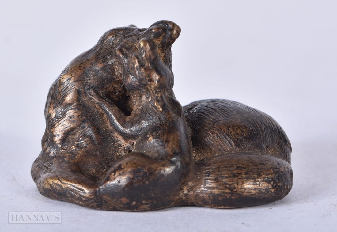 A CHINESE BRONZE FOX. 4 cm x 3 cm. (1 of 4)