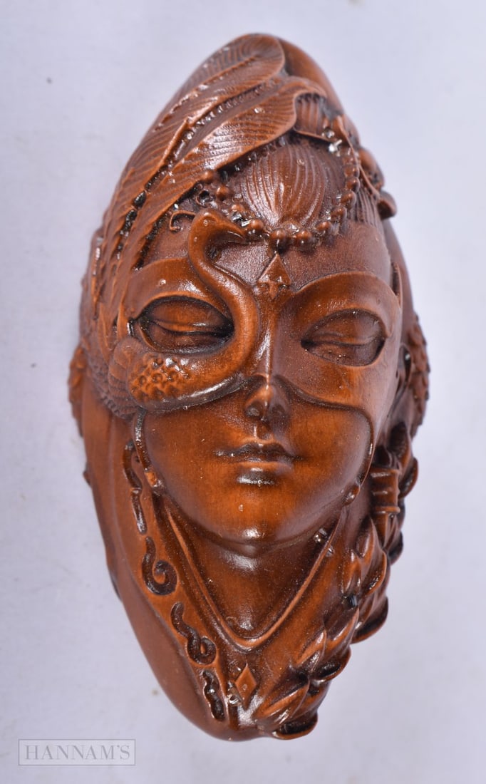 A CHINESE WOOD MASK. 7.5 cm x 4 cm.: A CHINESE WOOD MASK. 7.5 cm x 4 cm.