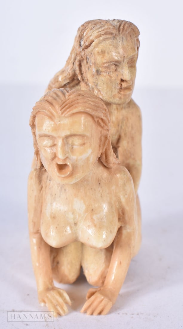 A JAPANESE EROTIC STAG ANTLER OKIMONO. 8 cm x 3 cm.: A JAPANESE EROTIC STAG ANTLER OKIMONO. 8 cm x 3 cm.