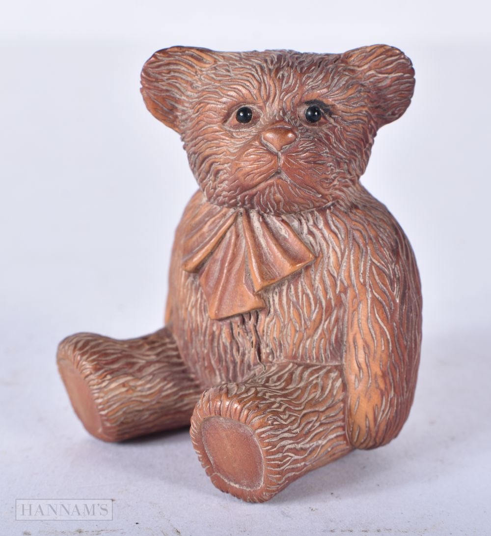 A JAPANESE WOOD BEAR NETSUKE. 6 cm x 4 cm. (1 of 3)