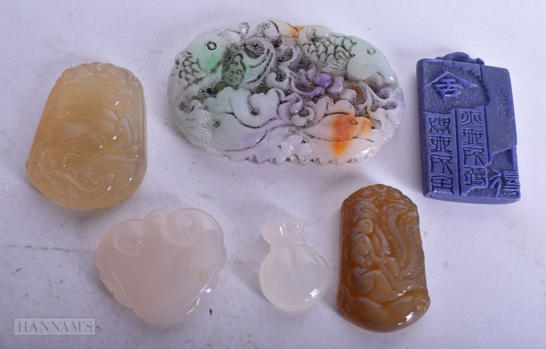CHINESE STONE PENDANTS. 7 cm x 4.75 cm. (qty) (1 of 2)
