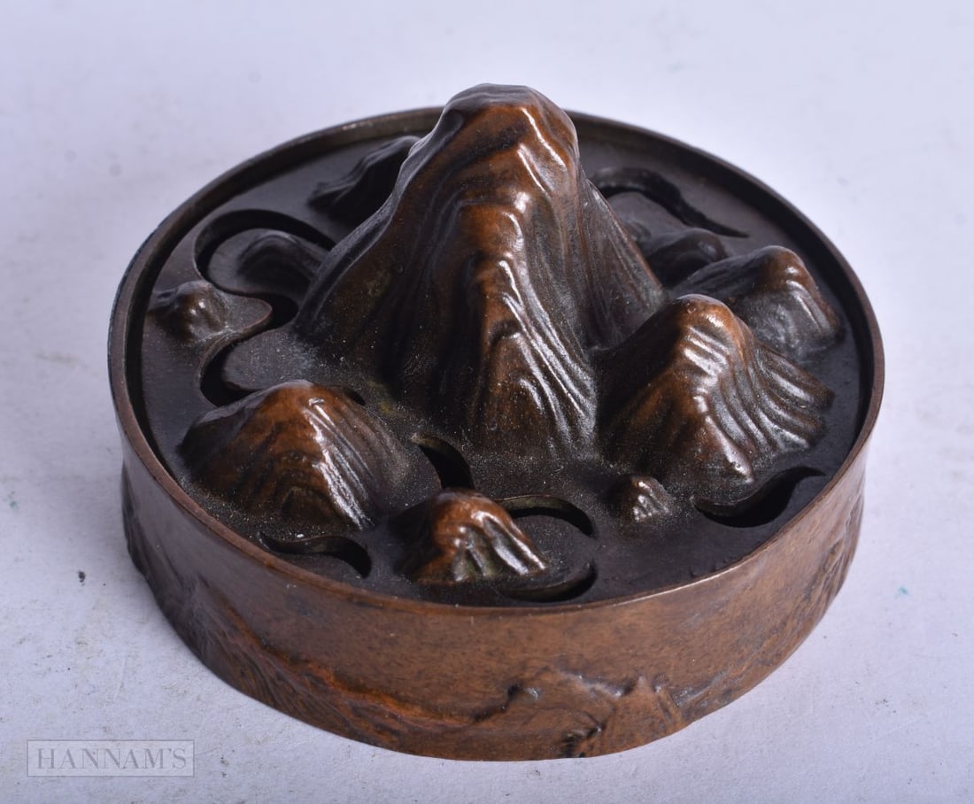 A CHINESE BRONZE MOUNTAIN CENSER. 7.25 cm wide. (1 of 4)