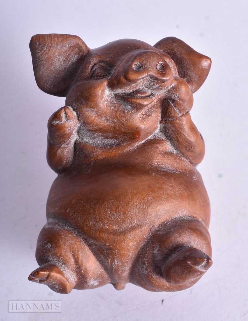 A JAPANESE WOOD PIG. 6.5 cm x 5.5 cm. (1 of 3)