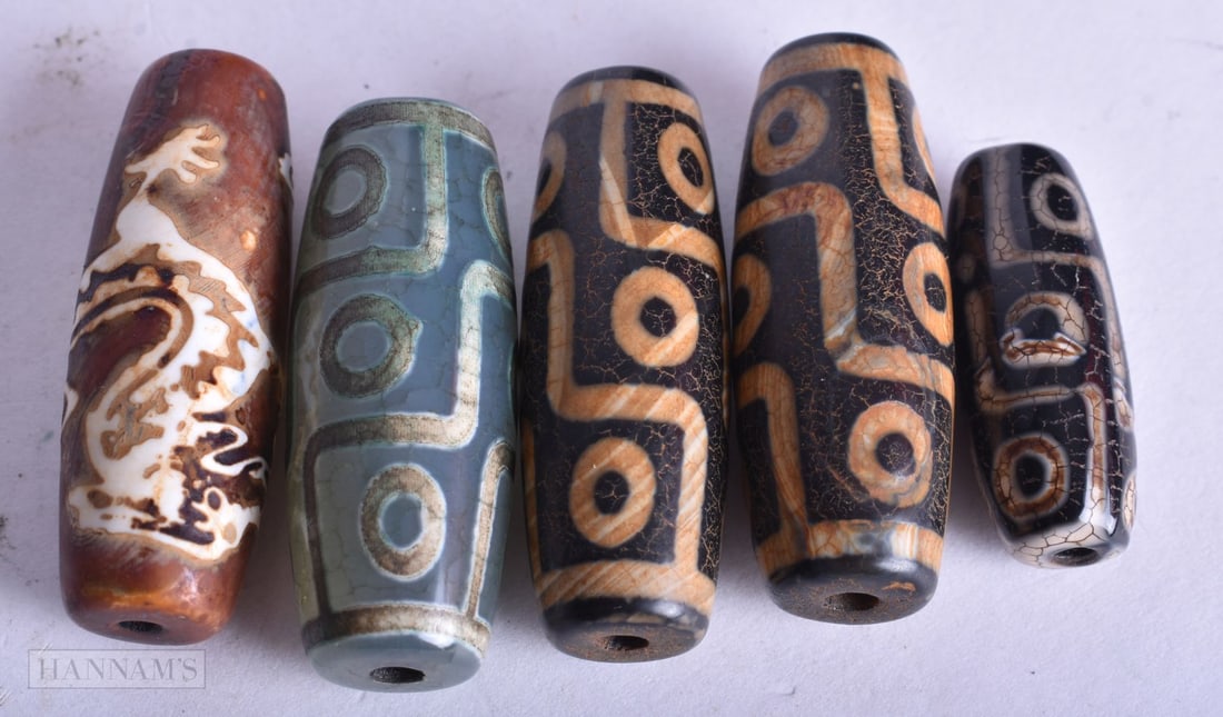 FIVE TIBETAN ZHU BEADS. 57.5 grams. 4 cm long. (5) (1 of 3)