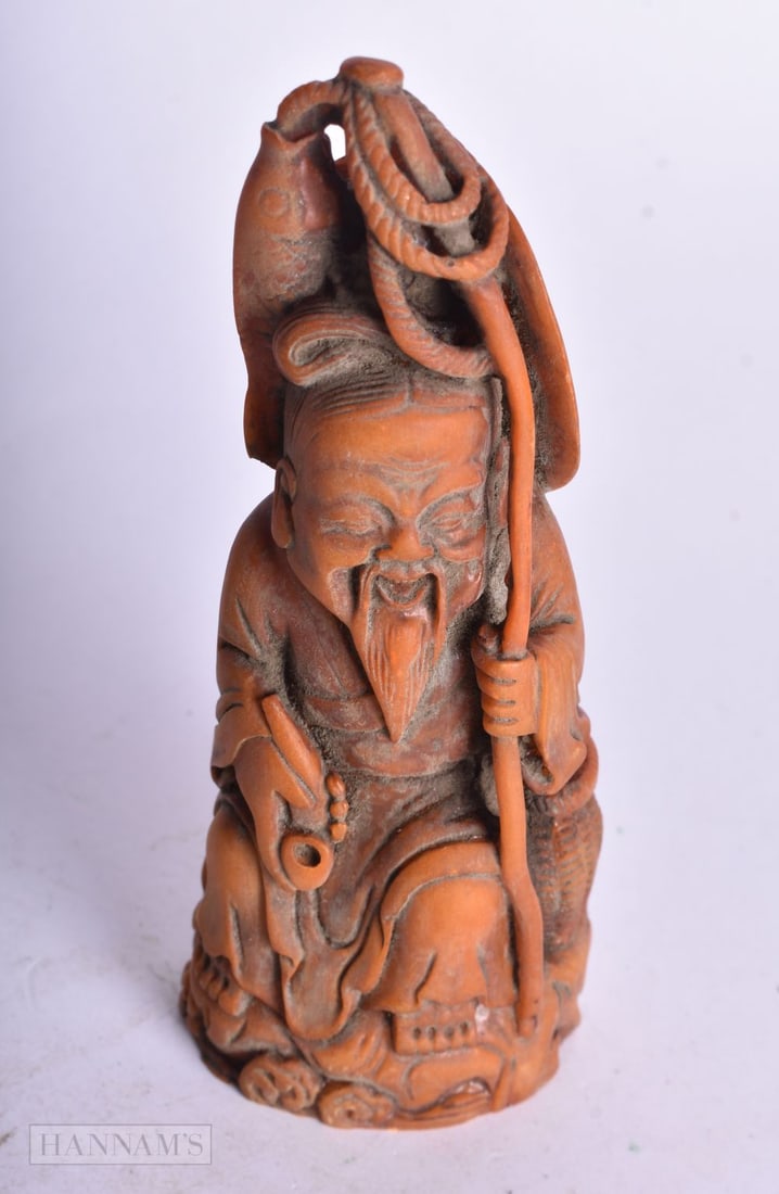 A CHINESE STONE FISHERMAN. 13 cm high. (1 of 4)