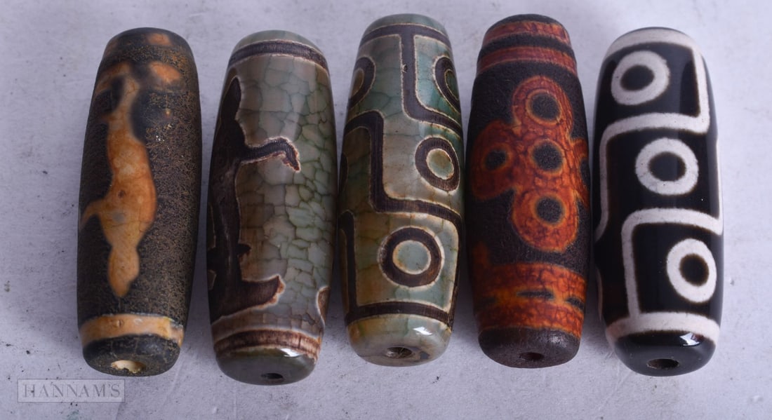 FIVE TIBETAN ZHU BEADS. 63 grams. 4 cm long. (5): FIVE TIBETAN ZHU BEADS. 63 grams. 4 cm long. (5)