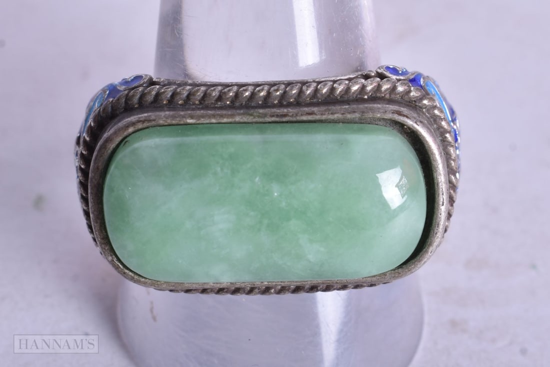 A CHINESE JADE RING. V. 17 grams.: A CHINESE JADE RING. V. 17 grams.
