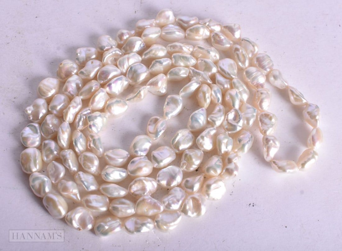 A BAROQUE PEARL NECKLACE. 86 grams. 122 cm long.: A BAROQUE PEARL NECKLACE. 86 grams. 122 cm long.