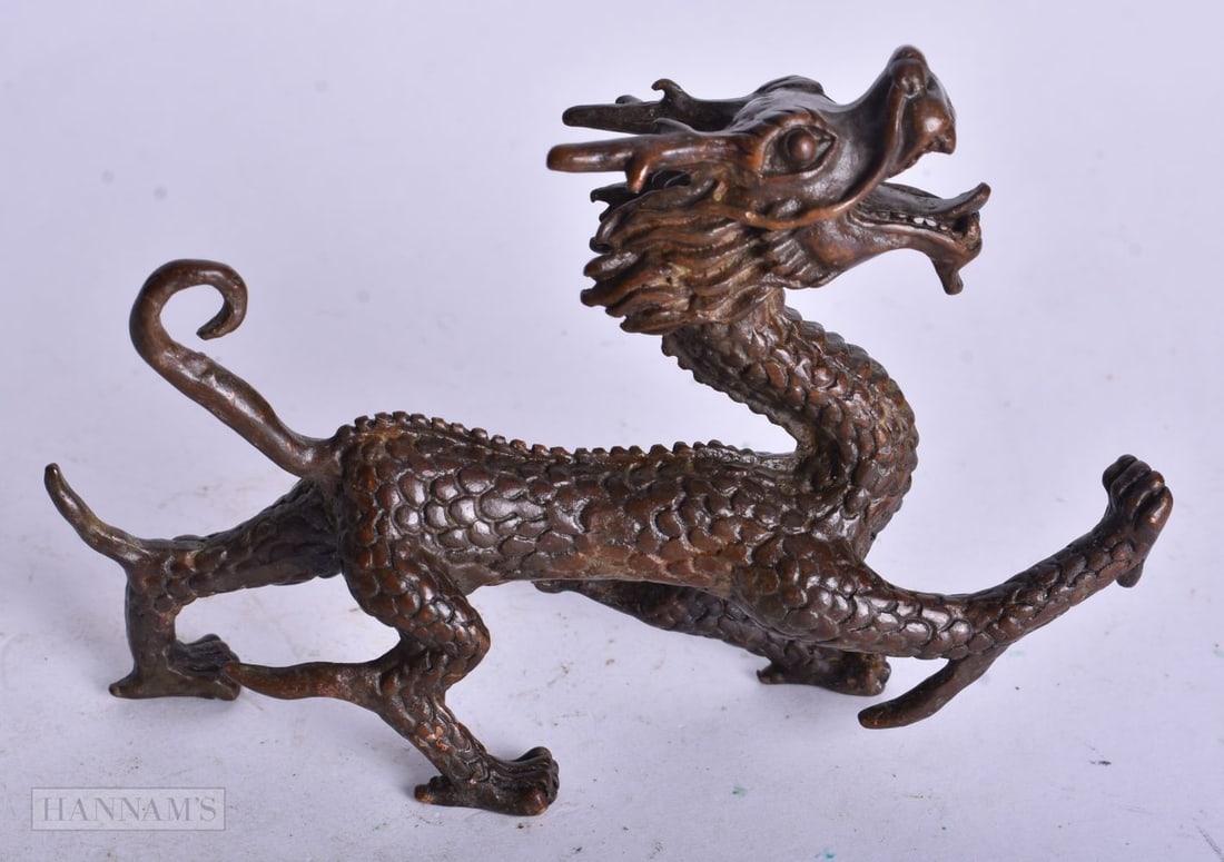 A CHINESE BRONZE DRAGON. 163 grams. 7 cm x 10.5 cm. (1 of 4)