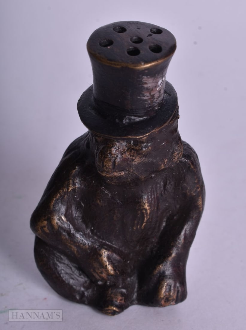 A CONTINENTAL BRONZE MONKEY. 6.5 cm x 4 cm. (1 of 4)