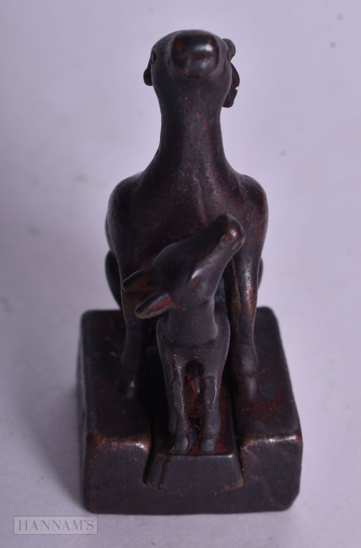 A CHINESE BRONZE DEER. 5 cm x 2.5 cm. (1 of 3)
