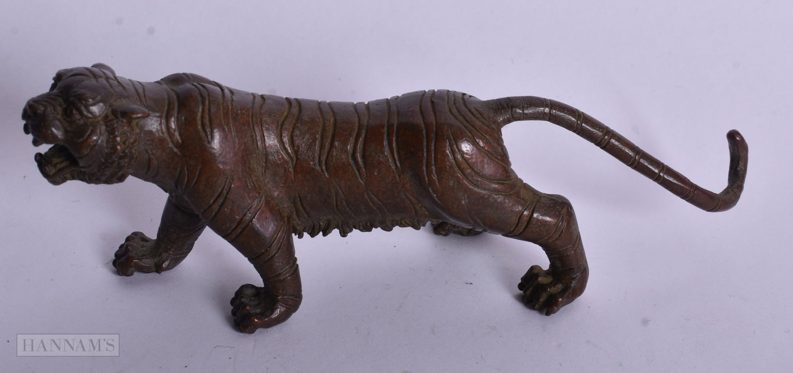 A JAPANESE BRONZE TIGER. 13.75 cm wide. (1 of 4)