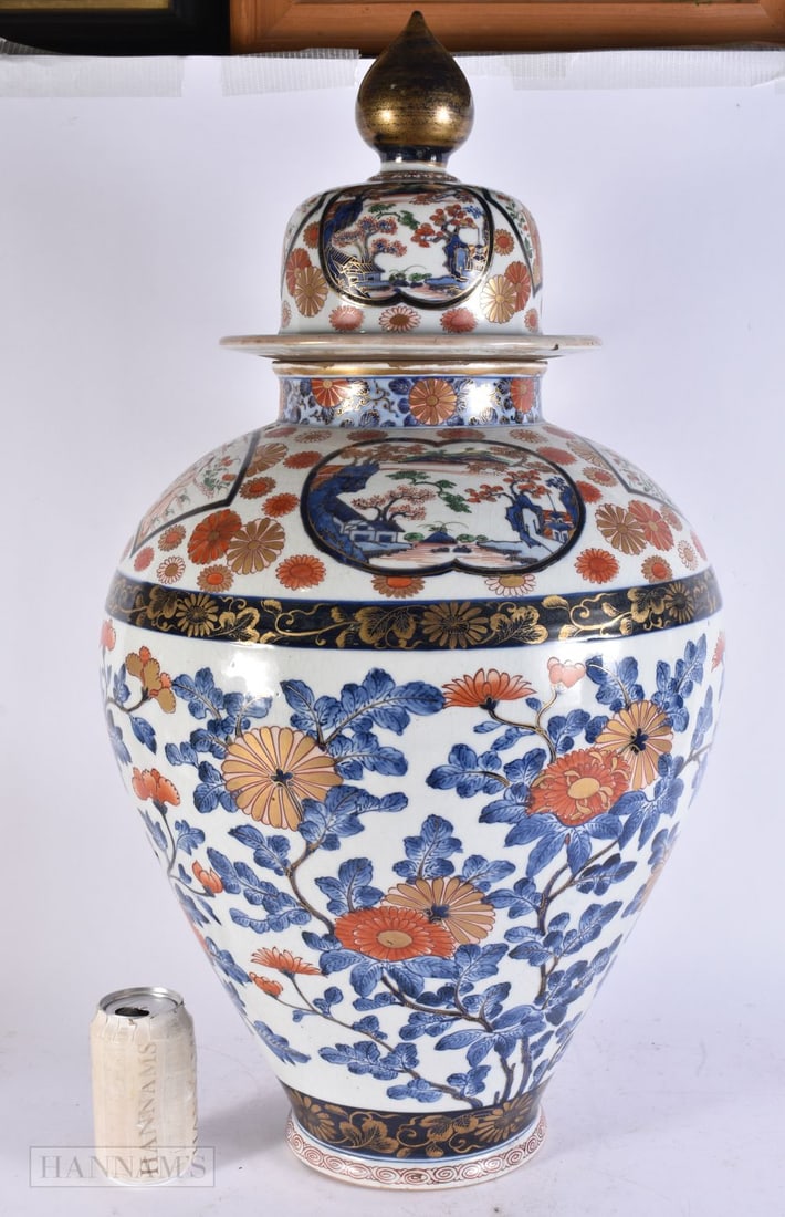 A MONUMENTAL 18TH CENTURY JAPANESE EDO PERIOD IMARI VASE AND COVER painted with flowers and landscap (1 of 7)