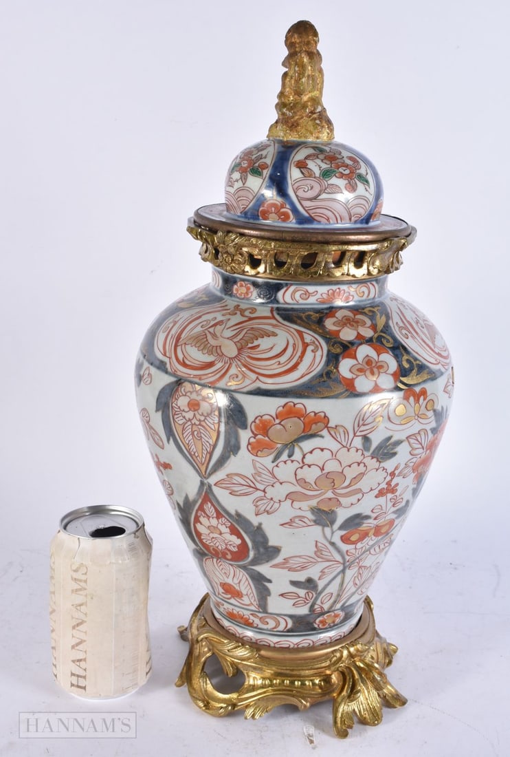 AN 18TH CENTURY JAPANESE EDO PERIOD IMARI VASE AND COVER with ormolu mounts. 42 cm high. (1 of 4)