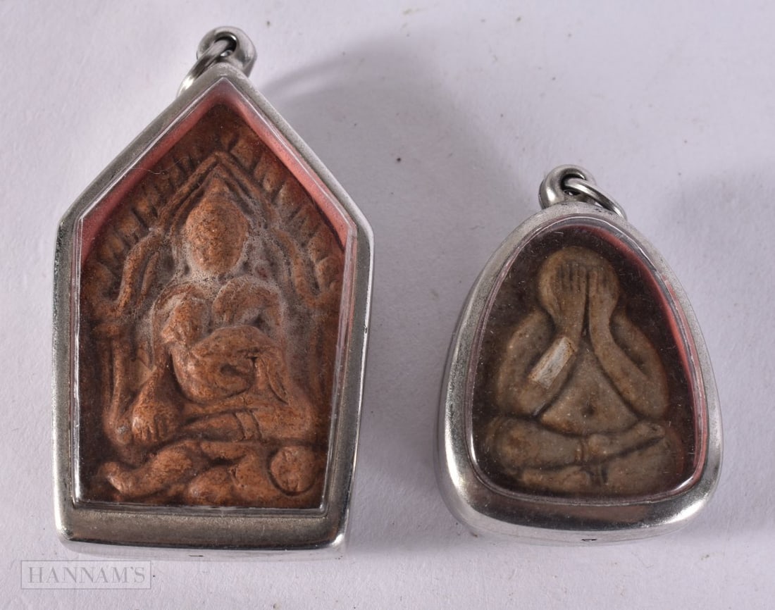 TWO SOUTH EAST ASIAN POTTERY PENDANTS. 6 cm x 3.25 cm. (1 of 2)