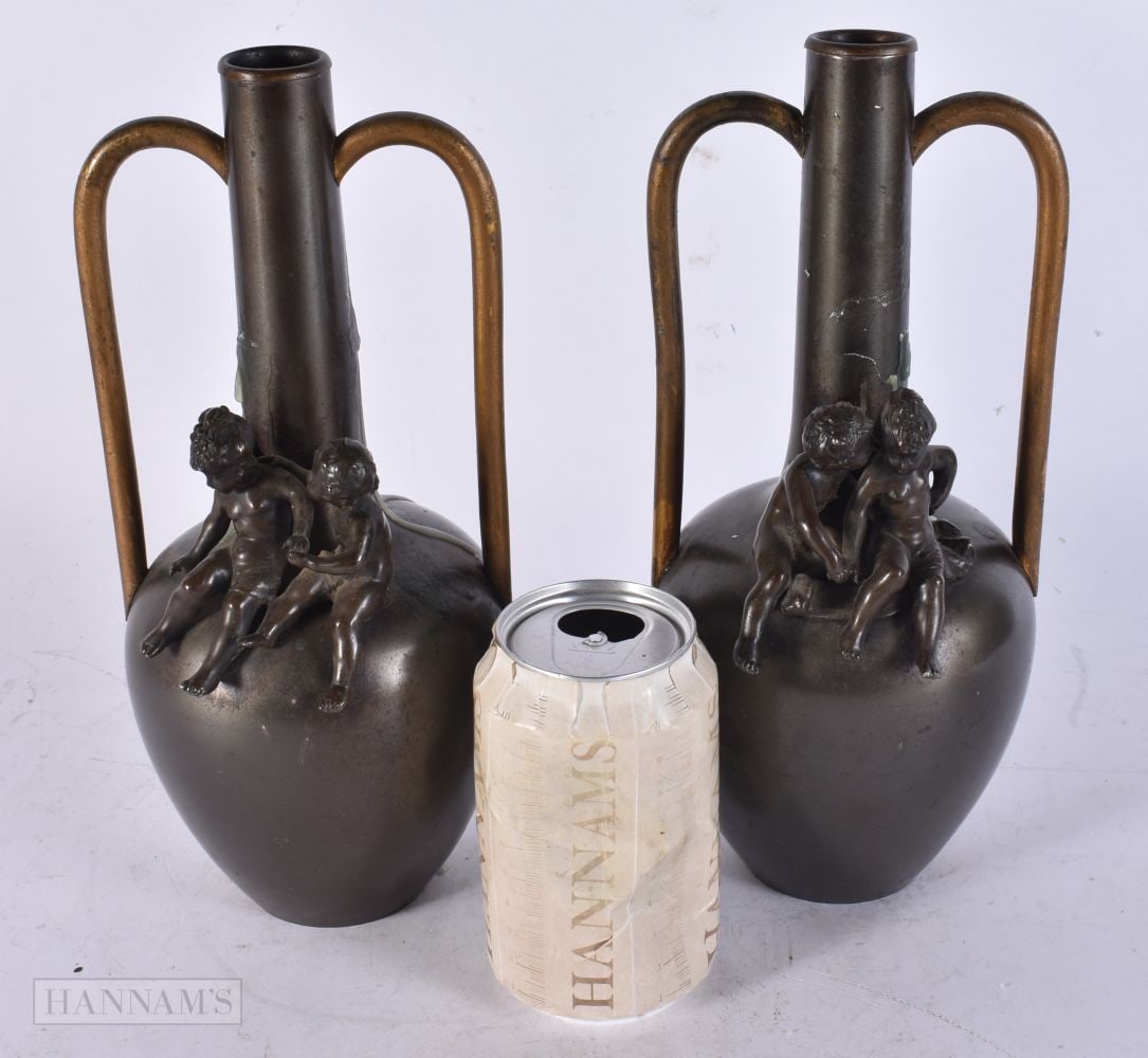 A PAIR OF ANTIQUE BRONZE VASES. 27 cm high. (1 of 4)