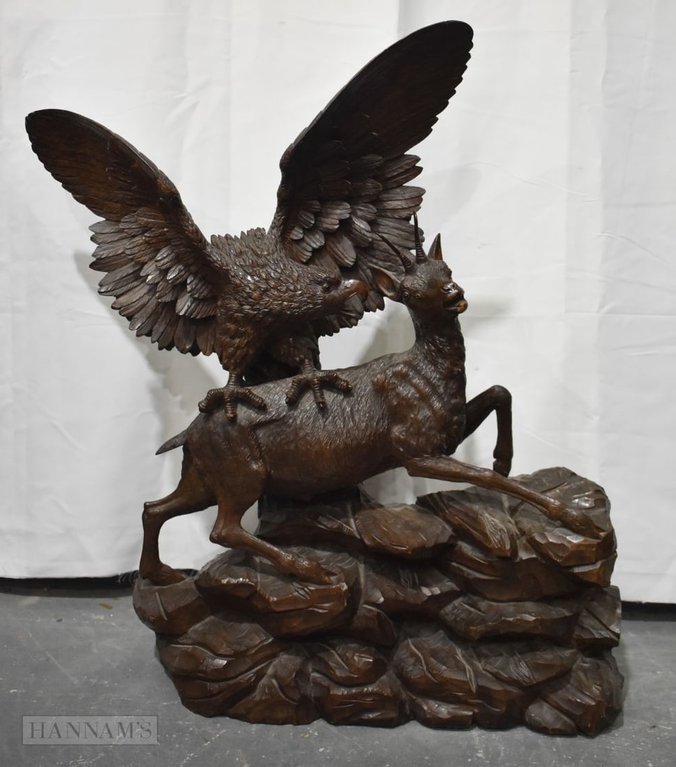 A VERY LARGE 19TH CENTURY BAVARIAN BLACK FOREST CARVED WOOD SCULPTURE. 90.5 cm x 64 cm. (1 of 3)