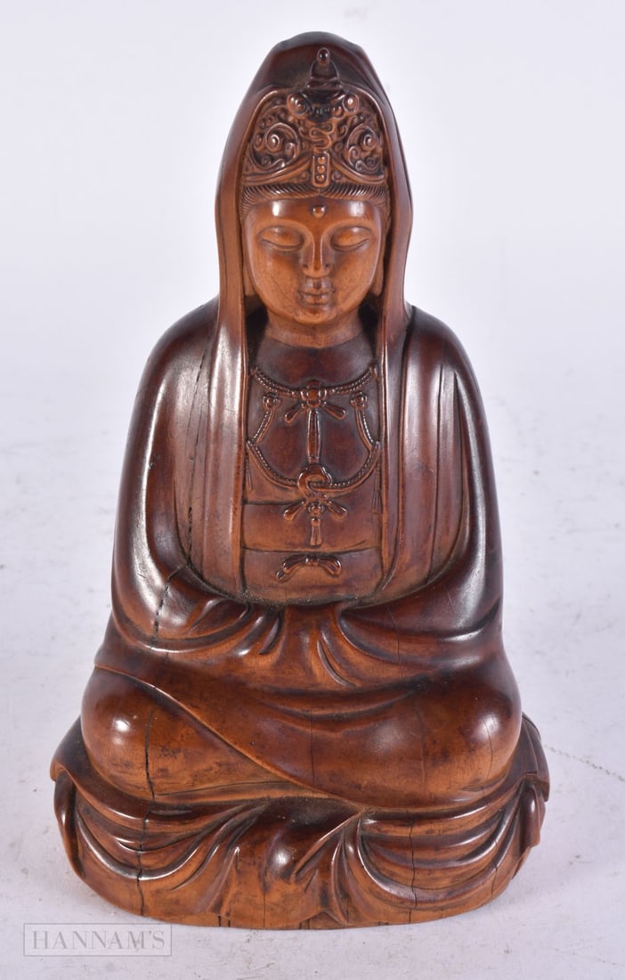 A 19TH CENTURY CHINESE CARVED HEARTWOOD FIGURE OF AN IMMORTAL Qing. 22 cm high.: A 19TH CENTURY CHINESE CARVED HEARTWOOD FIGURE OF AN IMMORTAL Qing. 22 cm high.