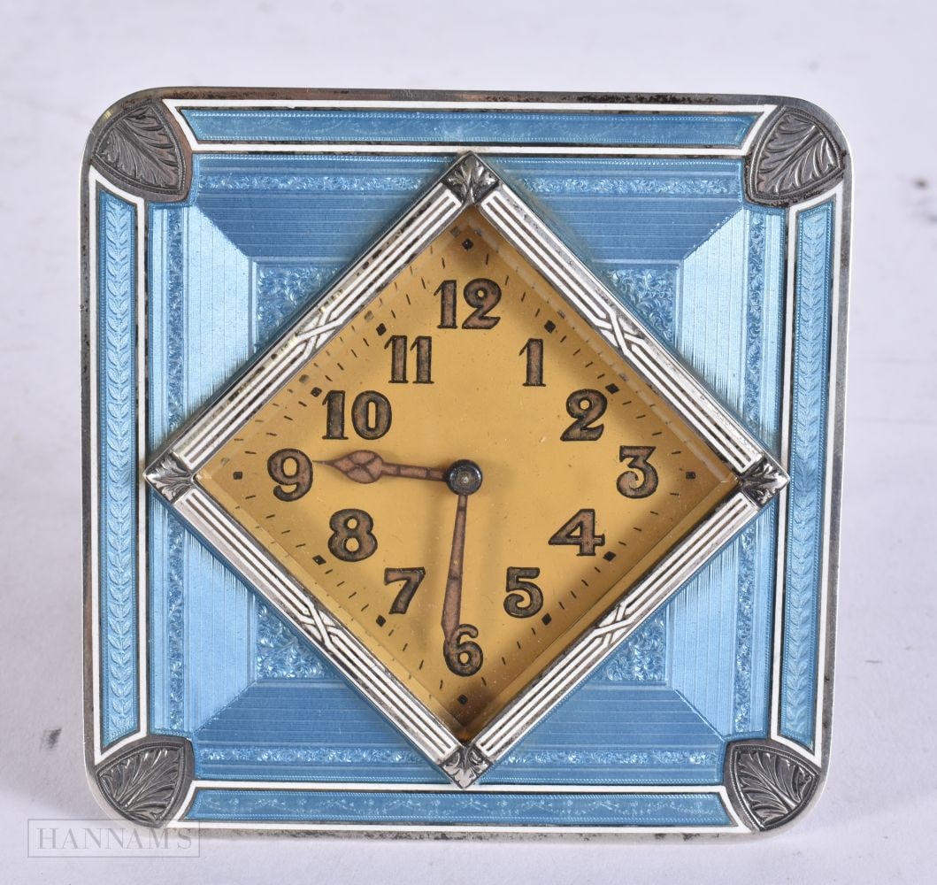 AN ART DECO SILVER AND ENAMEL WERA STRUT CLOCK. Running. 398 grams overall. 8.75 cm square. (1 of 3)