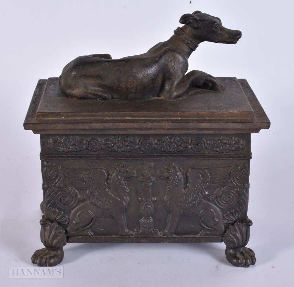 AN EARLY 19TH CENTURY GERMAN BERLIN IRON TOBACCO BOX AND COVER formed with griffin lions and a recum (1 of 4)