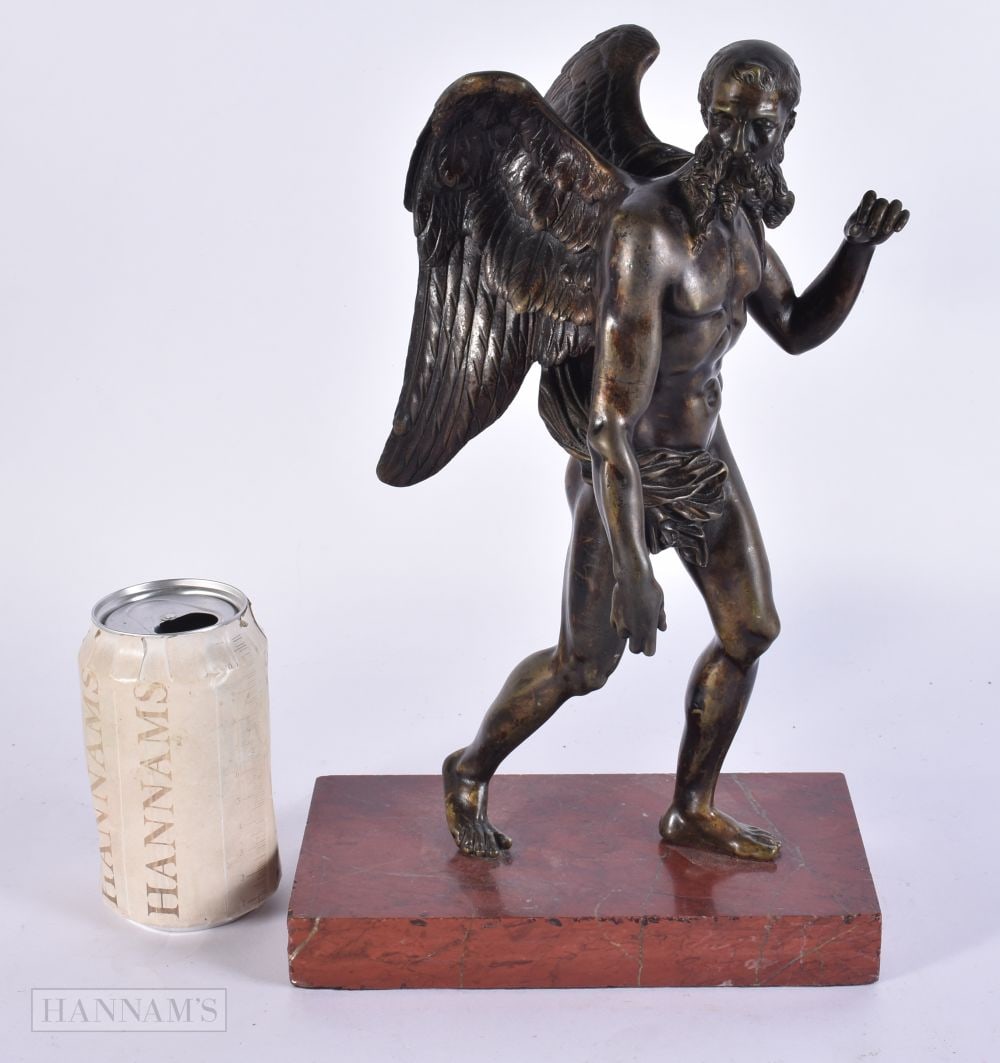 AN 18TH/19TH CENTURY GRAND TOUR BRONZE FIGURE OF CHRONOS modelled upon a red marble base. 32 cm x 17: AN 18TH/19TH CENTURY GRAND TOUR BRONZE FIGURE OF CHRONOS modelled upon a red marble base. 32 cm x 17 cm.