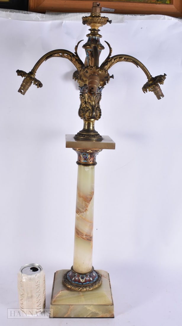 AN UNUSUAL 19TH CENTURY FRENCH BRONZE, ONYX AND CHAMPLEVE ENAMEL LAMP formed as a standing pedestal (1 of 2)