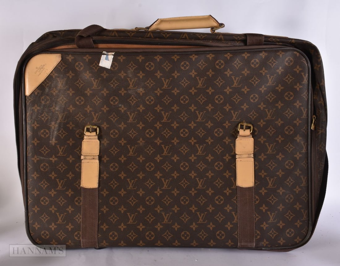A VINTAGE LEATHER SUITCASE. 70 cm x 44 cm. (1 of 5)