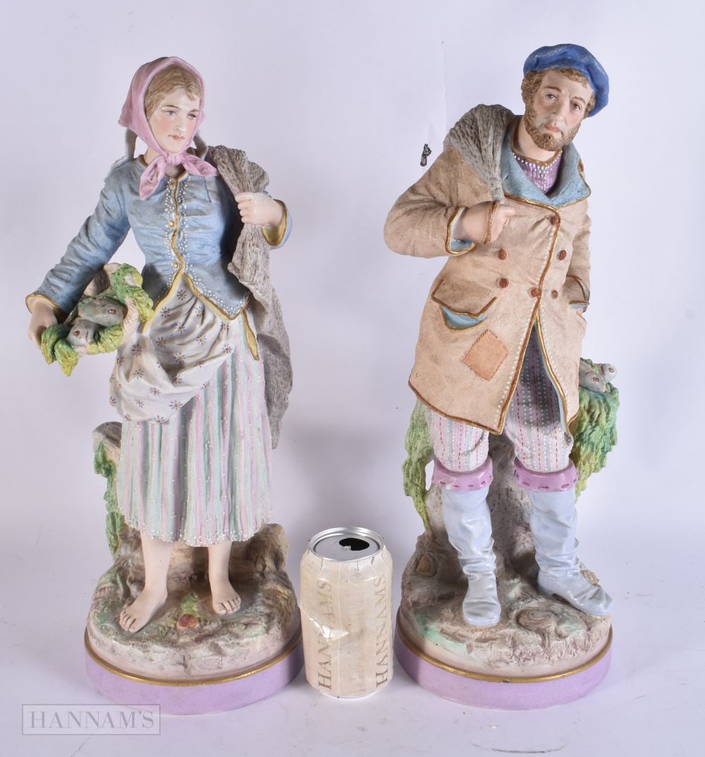 A LARGE PAIR OF 19TH CENTURY FRENCH BISQUE PORCELAIN FIGURES by Letu & Mauger, modelled as a male an: A LARGE PAIR OF 19TH CENTURY FRENCH BISQUE PORCELAIN FIGURES by Letu & Mauger, modelled as a male and female holding a basket of fish. 44 cm high.