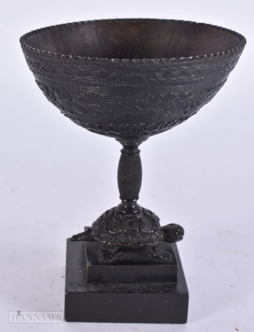 AN UNUSUAL EARLY 19TH CENTURY BRONZE AND COCONUT SHELL BOWL formed with a tortoise upon a marble pli (1 of 3)