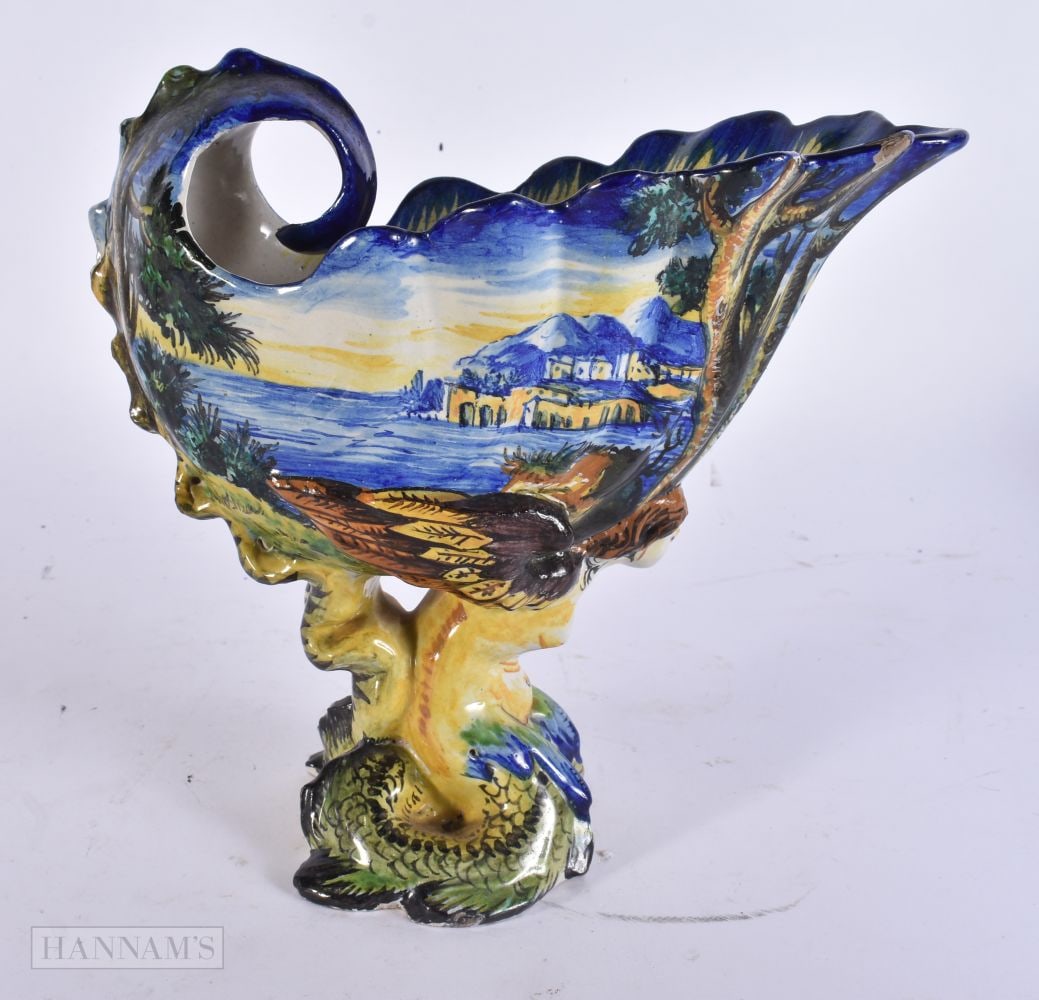 A 19TH CENTURY ITALIAN MAJOLICA FAIENCE CANTAGALLI EWER painted with landscapes. 19 cm x 19 cm. (1 of 5)