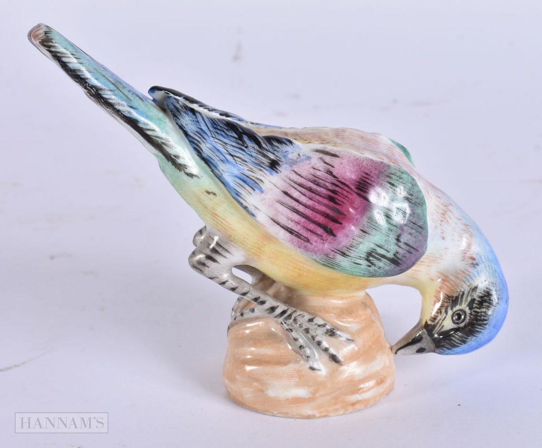 AN ANTIQUE GERMAN PORCELAIN FIGURE OF A BIRD possibly Meissen. 9 cm x 7 cm. (1 of 4)