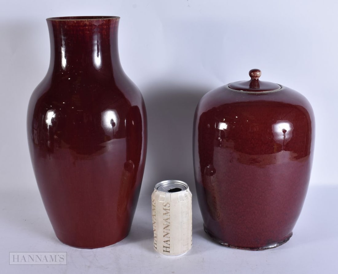 A LARGE 19TH CENTURY CHINESE SANG DU BOEUF PORCELAIN VASE together with a jar and cover. Largest 38 (1 of 4)
