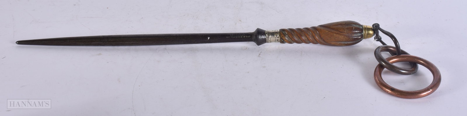 A 19TH CENTURY CARVED RHINOCEROS HORN HANDLED STEEL. 59 cm long.: A 19TH CENTURY CARVED RHINOCEROS HORN HANDLED STEEL. 59 cm long.