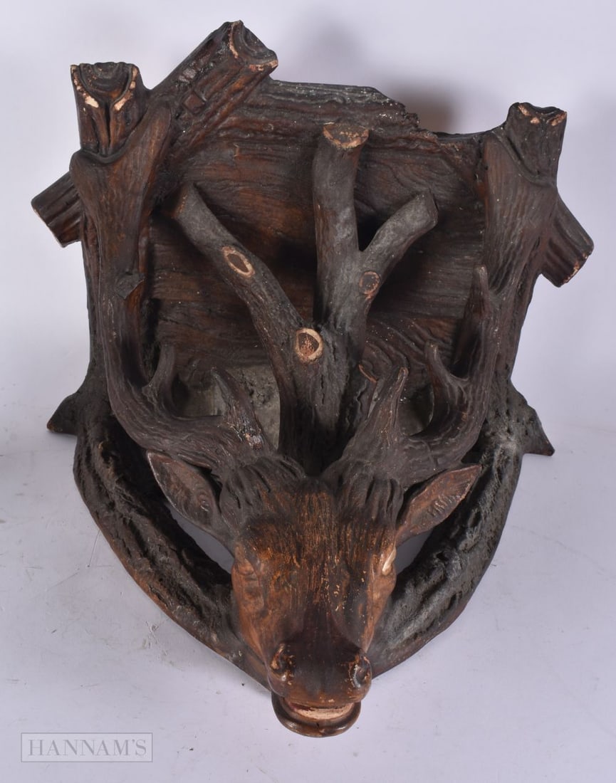 A RARE 19TH CENTURY AUSTRIAN GERMAN TERRACOTTA WALL BRACKET After a black forest wood carving. 28 cm: A RARE 19TH CENTURY AUSTRIAN GERMAN TERRACOTTA WALL BRACKET After a black forest wood carving. 28 cm x 32 cm.