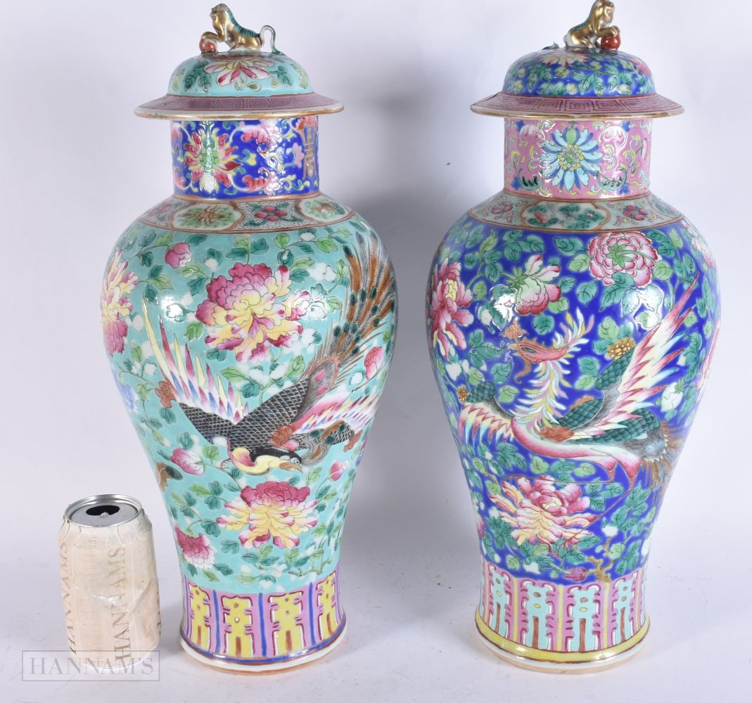 A LARGE PAIR OF 19TH CENTURY CHINESE STRAITS PORCELAIN VASES AND COVERS Qing, painted with hoho bird: A LARGE PAIR OF 19TH CENTURY CHINESE STRAITS PORCELAIN VASES AND COVERS Qing, painted with hoho birds and foliage on a blue and turquoise ground. 44 cm x 15 cm.