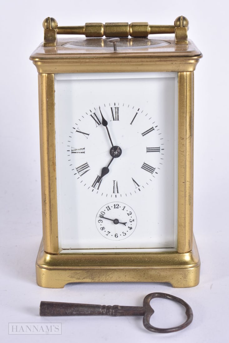 AN ANTIQUE FRENCH REPEATING CARRIAGE CLOCK. Working. 15 cm high inc handle. (1 of 6)