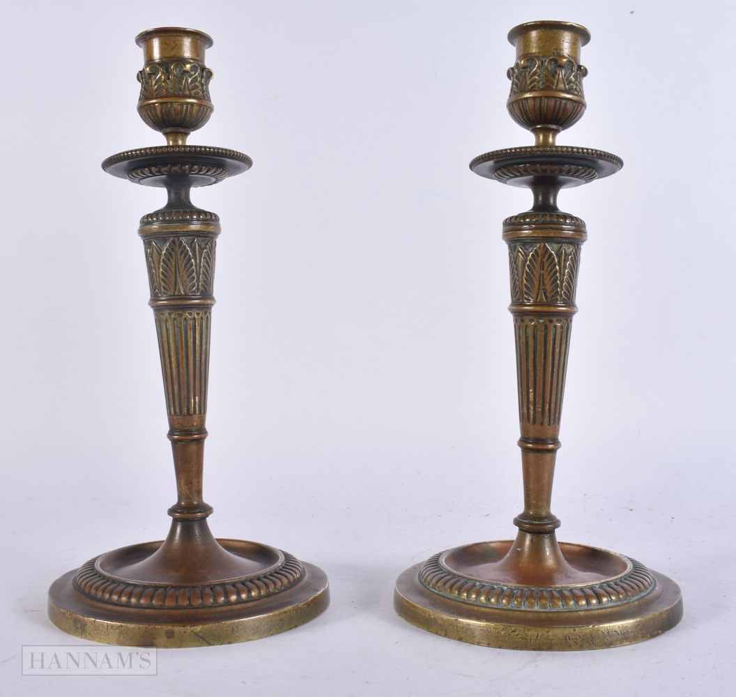 A PAIR OF 19TH CENTURY FRENCH BRONZE CANDLESTICKS signed F De La Rue of Paris. 24 cm high. (1 of 6)