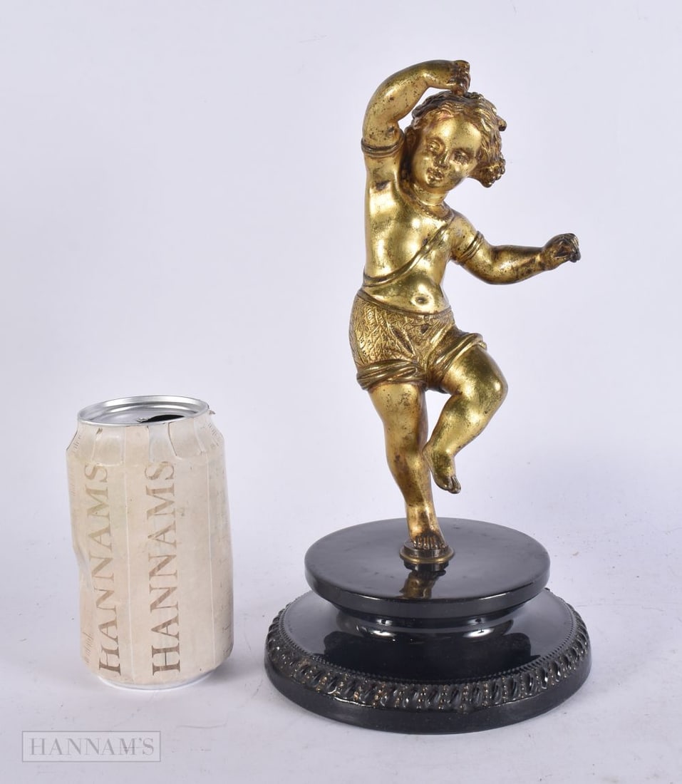 A 19TH CENTURY FRENCH GILT BRONZE FIGURE OF A DANCER modelled holding castanets. 26 cm high. (1 of 4)