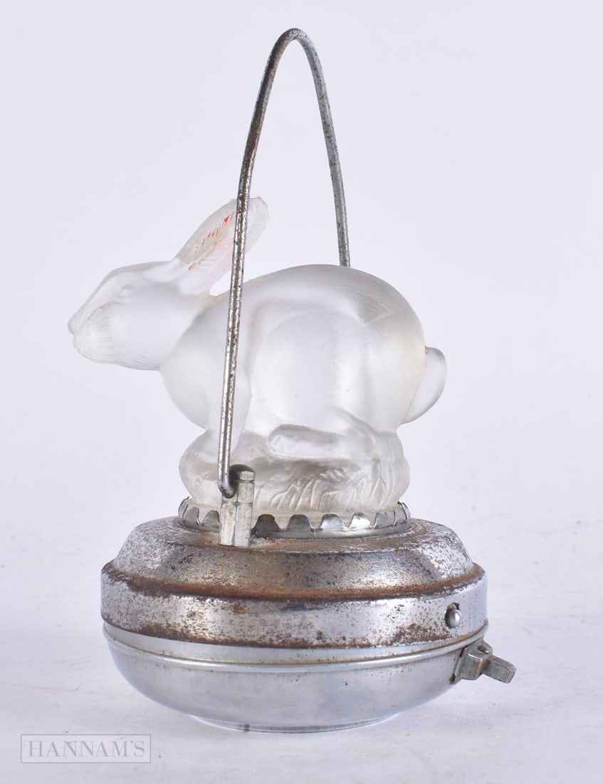 A VINTAGE STESCO SERIES TRAVELLING GLASS RABBIT LIGHT. 15 cm high. (1 of 4)