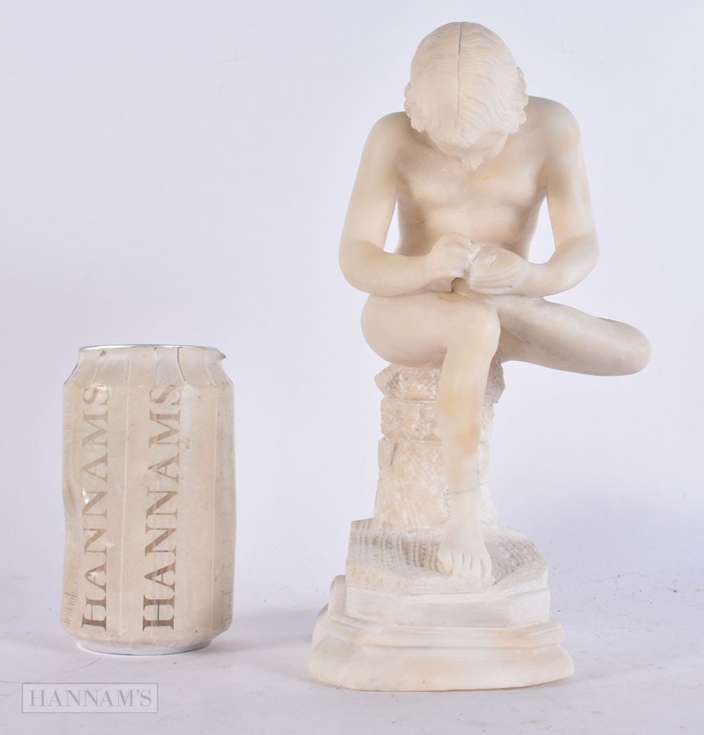 A LATE 19TH CENTURY GRAND TOUR ALABASTER FIGURE OF SPINARIO modelled seated. 24 cm high.: A LATE 19TH CENTURY GRAND TOUR ALABASTER FIGURE OF SPINARIO modelled seated. 24 cm high.