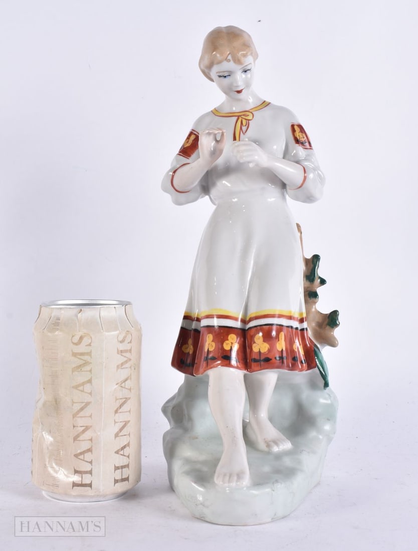 A LARGE USSR CERAMIC FIGURE OF A FEMALE. 29 cm high. (1 of 5)
