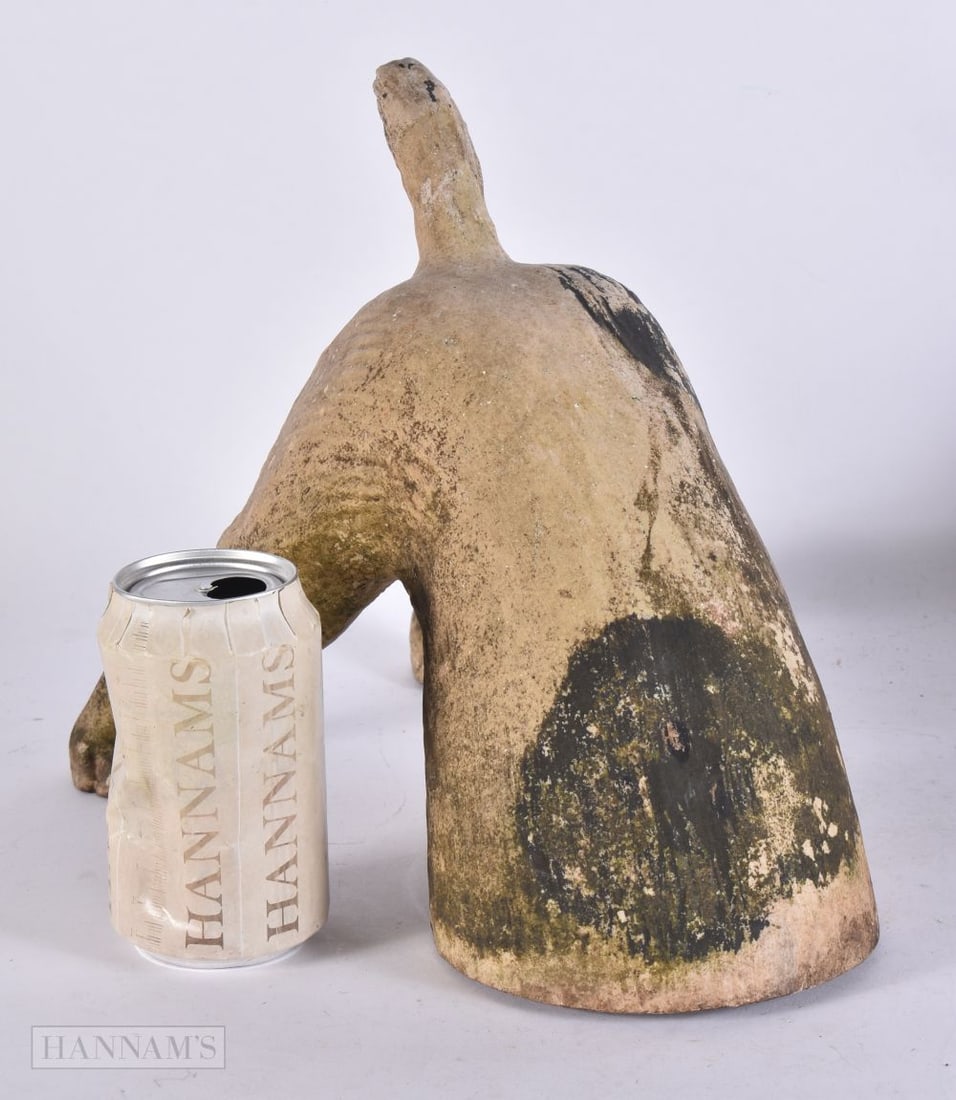 A CHARMING COLD PAINTED TERRACOTTA GARDEN MODEL OF A TERRIER BODY modelled burying its in the ground: A CHARMING COLD PAINTED TERRACOTTA GARDEN MODEL OF A TERRIER BODY modelled burying its in the ground. 27 cm x 30 cm.