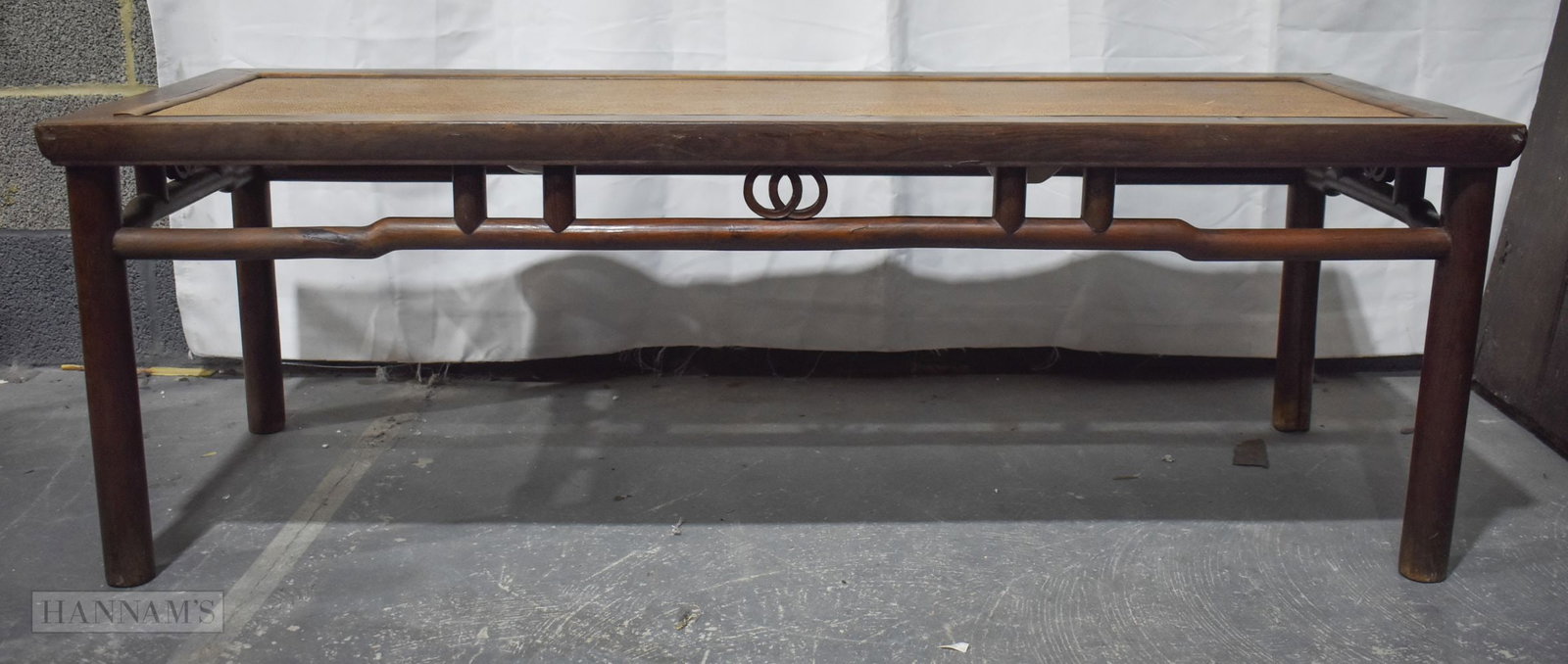 A CHINESE QING DYNASTY CARVED HARDWOOD LOW RECTANGULAR TABLE possibly Huanghuali. (1 of 11)