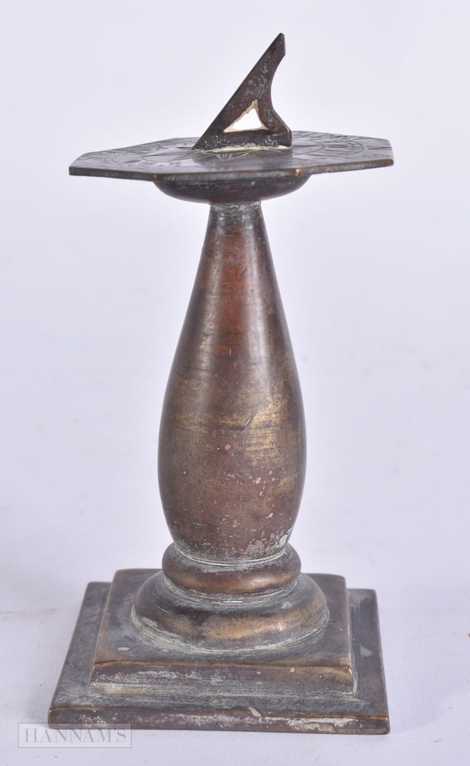 AN UNUSUAL ANTIQUE BRONZE DESK SUNDIAL. 11.5 cm high. (1 of 4)