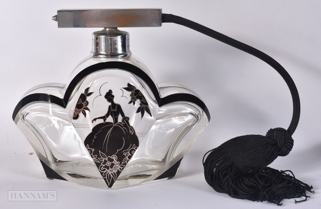 AN ART DECO ENAMELLED GLASS SCENT BOTTLE painted with a female amongst flowers. 16 cm x 14 cm.: AN ART DECO ENAMELLED GLASS SCENT BOTTLE painted with a female amongst flowers. 16 cm x 14 cm.